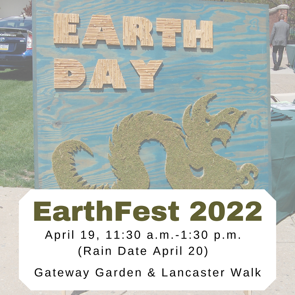 Picture of an Earth Day sign with the Drexel Dragon below.